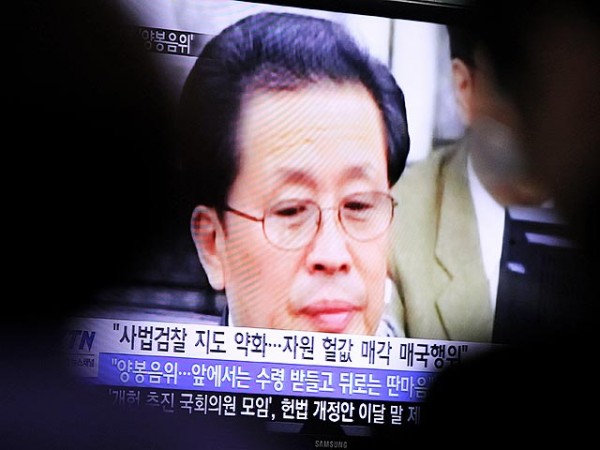 Dec. 12, 2013 - Jang Song Thaek, the uncle of North Korean leader Kim Jong Un has been executed as a ''traitor for all ages,'' the official news agency reported.  PICTURED: Dec. 9, 2013 - Seoul, South Korea - People watch a TV news program showing Jang Song-thaek, uncle-in-law of DPRK leader Kim Jong-Un, at the Seoul Railway Station. The Democratic People's Republic of Korea (DPRK) announced Monday Jang Song-thaek, was removed from all posts and expelled from the Workers' Party of Korea (WPK) for his ''anti-Party and counterrevolutionary crime,'' the official news agency KCNA reported. (Credit Image: © Park Jin-Hee/Xinhua/ZUMAPRESS.com)