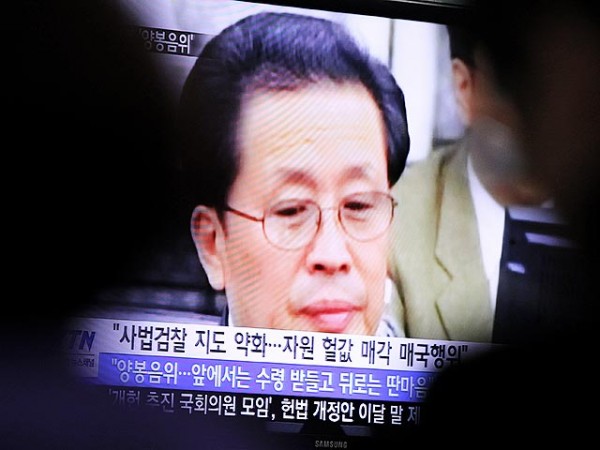Dec. 12, 2013 - Jang Song Thaek, the uncle of North Korean leader Kim Jong Un has been executed as a ''traitor for all ages,'' the official news agency reported. PICTURED: Dec. 9, 2013 - Seoul, South Korea - People watch a TV news program showing Jang Song-thaek, uncle-in-law of DPRK leader Kim Jong-Un, at the Seoul Railway Station. The Democratic People's Republic of Korea (DPRK) announced Monday Jang Song-thaek, was removed from all posts and expelled from the Workers' Party of Korea (WPK) for his ''anti-Party and counterrevolutionary crime,'' the official news agency KCNA reported. (Credit Image: © Park Jin-Hee/Xinhua/ZUMAPRESS.com)