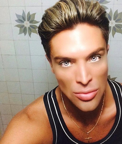 Pic shows: Mauricio Galdi is the new human Ken. A new real-life Ken doll has appeared on the scene just one year after the old one died - and he is also Brazilian. Last June, Celso Santebanes, 20, who spent 30,000 GBP on surgery to turn himself into a human version of Barbies boyfriend died after losing a five month battle with leukaemia. He started his transformation into manufacturer Mattel's iconic toy after winning a modelling contest at the age of 16 and was catapulted to fame after being spotted by a talk show in his native Sao Paulo. Now arch-rival Maurico Galdi, 27, has stepped into his shoes. The two had a falling out after Galdi posted a photo on his Instagram profile of himself holding a poster declaring he was the the real human Ken. Santebanes, who was then seriously ill, had reacted angrily accusing Galdi of being "an opportunist". Santebanes posted: "Shut up, fool, you do not have even a little respect, I know you posted the picture to offend me." "It is very ugly and false. He believes that if he has blue eyes and make up he is the new Ken, but he is an opportunist." He also threatened to take Galdi to court and compared him to Michael Jackson. But the pair later made up on a TV show. Now Galdi has taken over as the new human Ken after a survey carried out in Brazil voted him the most popular. Galdi, who is the son of a film distributor and a housewife from a middle-class neighbourhood of Sao Paulo, in east Brazil, said he always envied girls at school. He said: "I saw them playing with dolls and I wanted to do the same, but I never did for fear of prejudice." When he was 17 he began acting classes at a local drama school where he realised he wasnt considered beautiful. So he started having plastic surgery, starting with his nose. He said he also had polymethylmethacrylate put in several parts of his body to fill them out and make him more round and smooth. He said: "I never sought to be the Brazilian human Ken. "It was something that came to me, television sought to give me the title." And he paid tribute to his predecessor saying Santebanes was the "real Ken." He said: "He was and always will be the first Brazilian human Ken, let that title be for him". (ends)