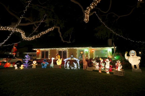 Christmas lights are seen on a home in the Sleepy Hollow neighborhood of Torrance, California, United States, December 15, 2015.  REUTERS/Lucy Nicholson