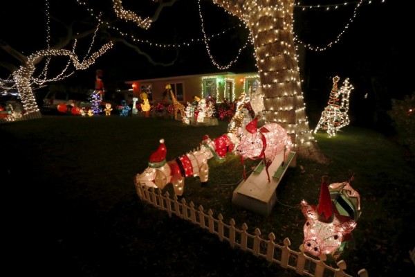 Holiday lights are seen on a home in the Sleepy Hollow neighborhood of Torrance, California, United States, December 15, 2015. REUTERS/Lucy Nicholson