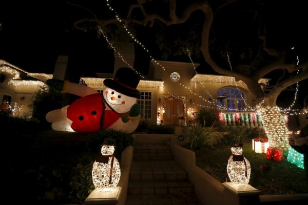 Christmas lights are seen on a home in the Sleepy Hollow neighborhood of Torrance, California, United States, December 15, 2015.  REUTERS/Lucy Nicholson