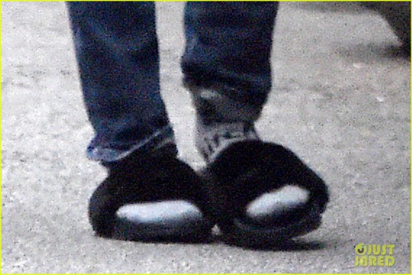 **USA ONLY** *EXCLUSIVE* **SHOT ON 11/23/15** New York, NY - Singer Rihanna seems to have forgotten to take her slippers off as she leaves her hotel in Soho New York, looking stylish in an oversized black and white coat and torn blue jeans. AKM-GSI November 25, 2015 **USA ONLY** To License These Photos, Please Contact : Steve Ginsburg (310) 505-8447 (323) 423-9397 steve@akmgsi.com sales@akmgsi.com or Maria Buda (917) 242-1505 mbuda@akmgsi.com ginsburgspalyinc@gmail.com