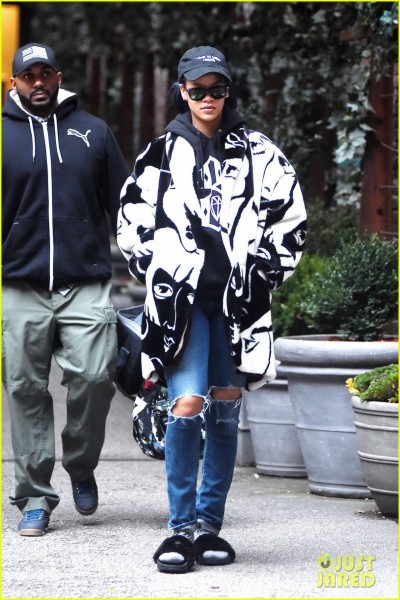 **USA ONLY** *EXCLUSIVE* **SHOT ON 11/23/15** New York, NY - Singer Rihanna seems to have forgotten to take her slippers off as she leaves her hotel in Soho New York, looking stylish in an oversized black and white coat and torn blue jeans. AKM-GSI November 25, 2015 **USA ONLY** To License These Photos, Please Contact : Steve Ginsburg (310) 505-8447 (323) 423-9397 steve@akmgsi.com sales@akmgsi.com or Maria Buda (917) 242-1505 mbuda@akmgsi.com ginsburgspalyinc@gmail.com