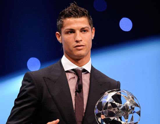 MONTE CARLO, MONACO - AUGUST 28: Cristiano Ronaldo of Manchester United holds his award of Player of the Year at the UEFA Champions League Draw for the 2008/2009 season at the Grimaldi Center on August 28, 2008 in Monte Carlo, Monaco. (Photo by Denis Doyle/Getty Images)