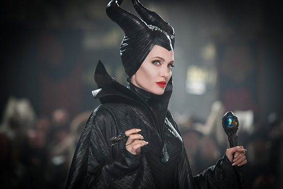 This July 17 2012, photo, released by Disney shows Angelina Jolie in a scene from "Maleficent." Spanish accesory designer Manuel Albarran created the collars and jewelry that Angelina Jolie wears on the movie “Maleficent”, which opens in Mexico and USA on May 30. Albarran, known as a metal couturier, worked closely with Jolie to achieve a look in between wild, femenine, shining and dark using materials like fur, leather and metal. (AP Photo/Disney, Frank Connor)