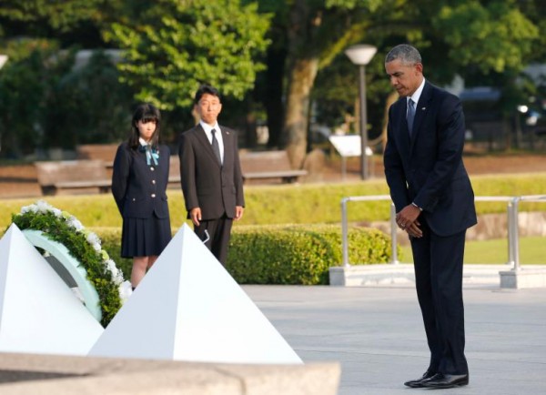 U.S. President Barack Obama stands after laying a wreath at the Hiroshima Peace Memorial Park in Hiroshima, western, Japan, Friday, May 27, 2016. Obama on Friday became the first sitting U.S. president to visit the site of the world's first atomic bomb attack, bringing global attention both to survivors and to his unfulfilled vision of a world without nuclear weapons. (AP Photo/Shuji Kajiyama)
