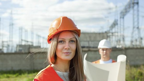 two workers wearing protective helmet